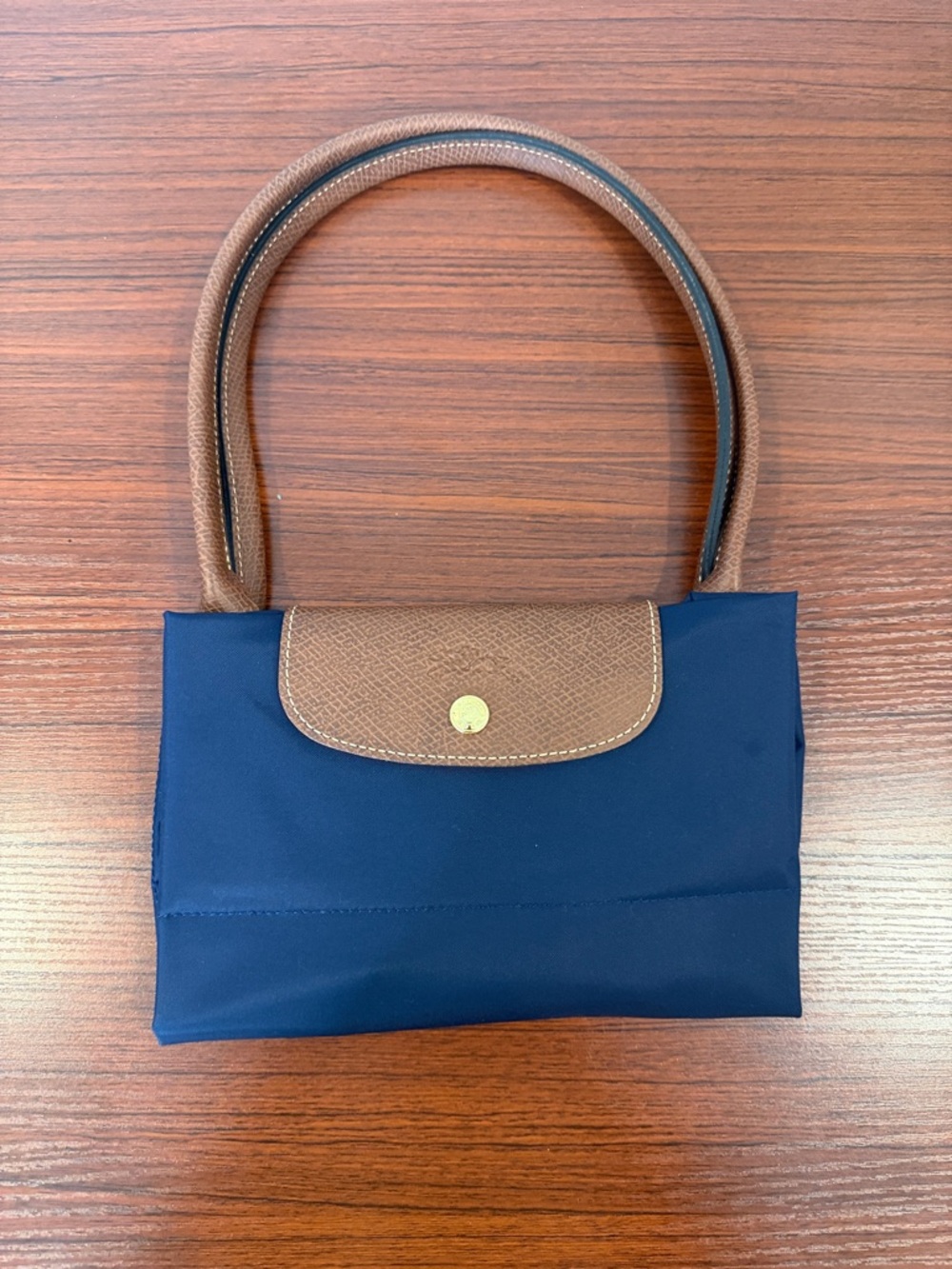 Longchamp Brand Navy Tote with Brown Leather Trim
